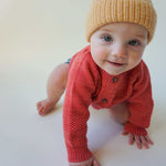 Load image into Gallery viewer, Toddler playing in red 2-Texture Raglan Sleeve Cardigan and yellow beanie knit hat
