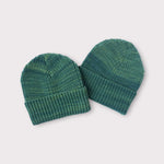 Load image into Gallery viewer, photo of two green knit beanie hats
