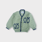 Load image into Gallery viewer, Flay view of sardine intarsia wool and baby alpaca sweater

