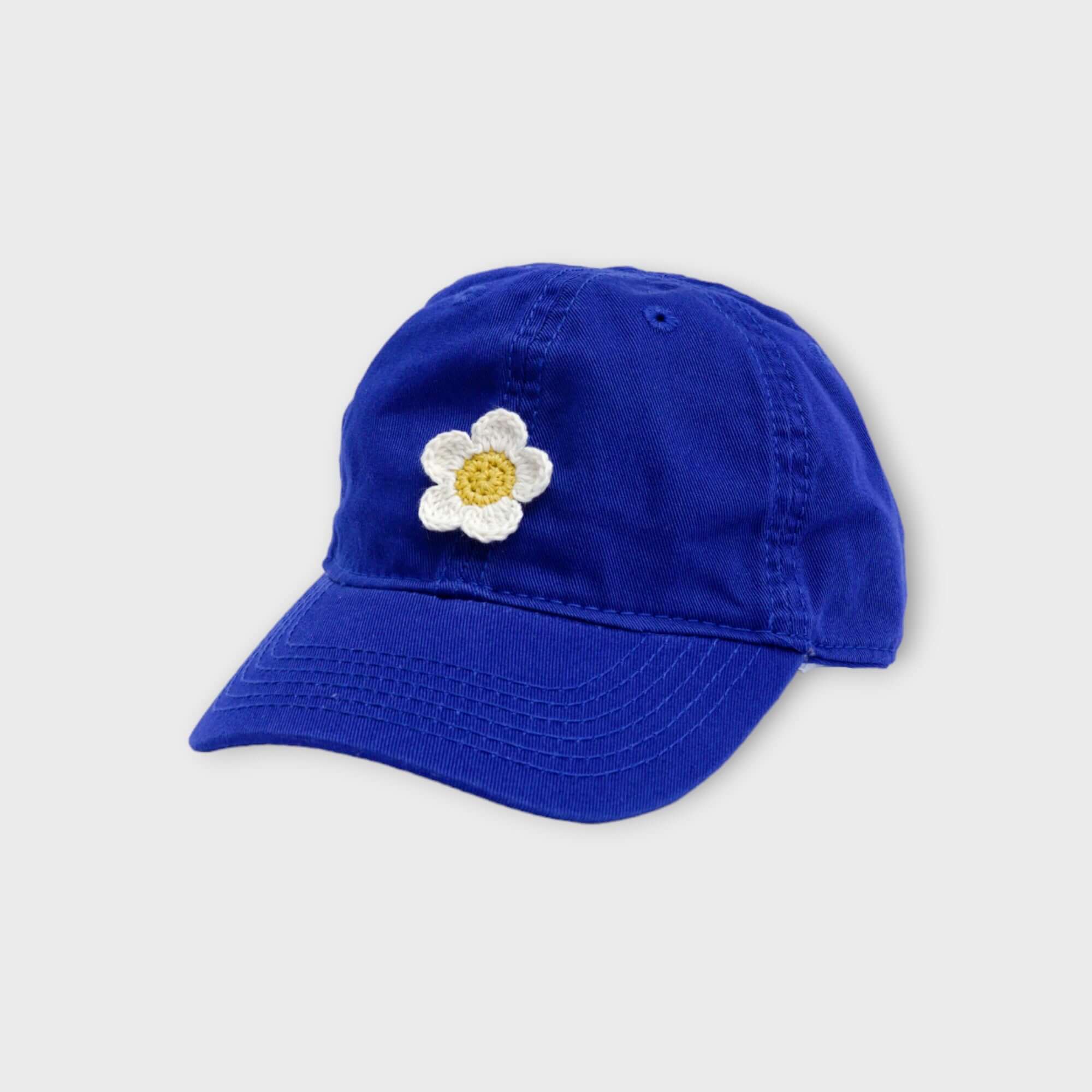 cobalt baseball hat with white daisy applique