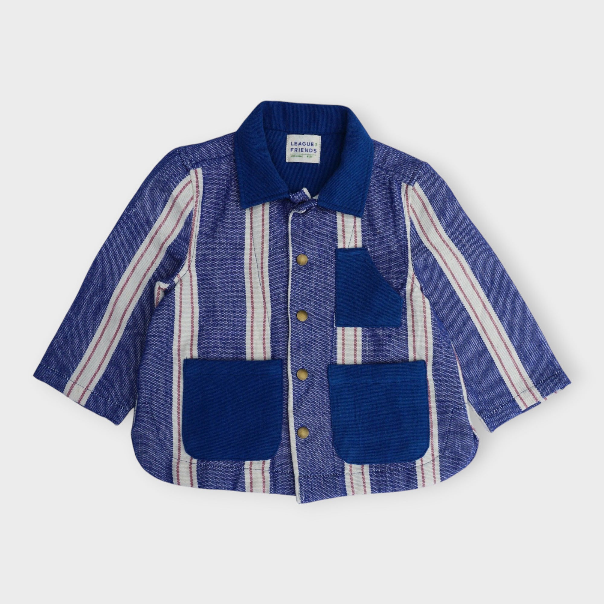 Organic cotton kids chore jacket in indigo blue umbrella stripe with antique brass snaps and patch pockets, by League of Friends

